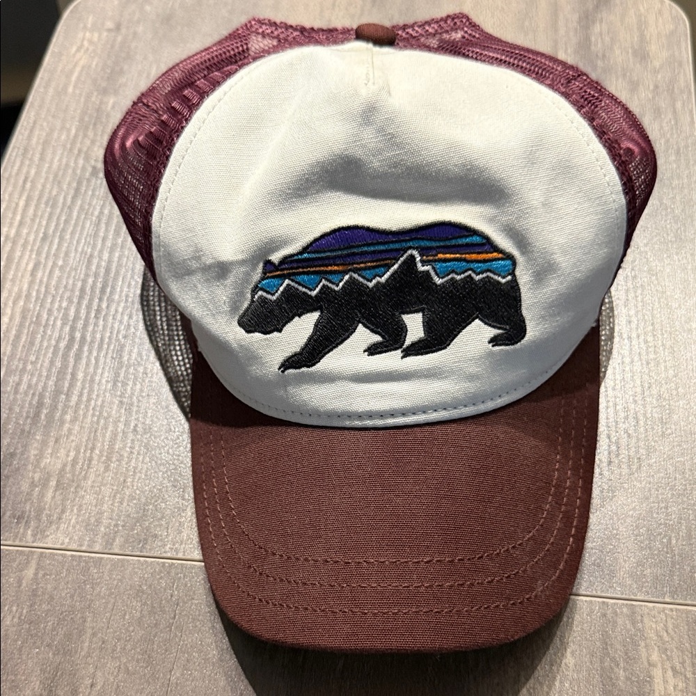 Burgundy and tan Patagonia trucker hat. Unisex